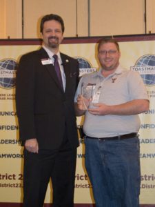 Cliff Colvin (right) receives the Area Director of the Year award from Immediate Past District Director Tracy Thomason (left.)